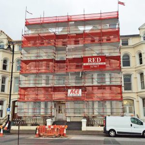 Commercial Scaffolding building decorating by RED Scaffolding Isle of Man